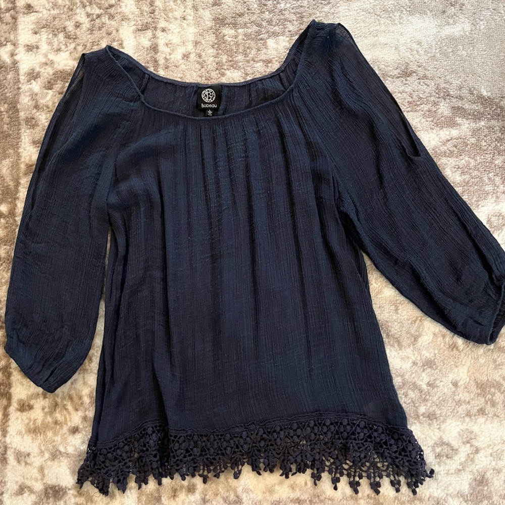 Really cute split sleeve blouse.  Bo way size large